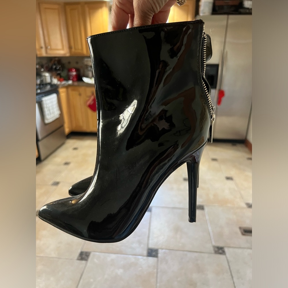 Patented leather stiletto booties